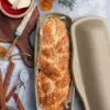 Long Covered Bread Pan with Braided Bread and Decorations