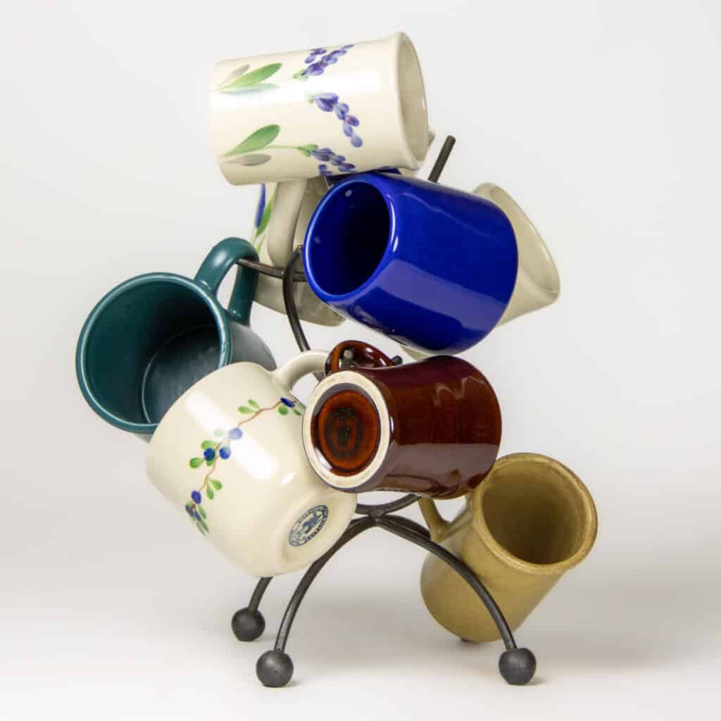 Mug Rack full of colorful ceramic mugs
