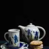 Field of Iris Tea Set with Pastries