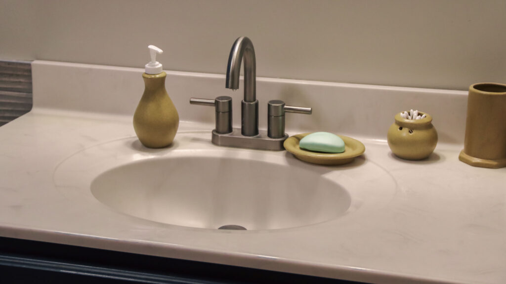 Go Green Earthware bathroom set on bathroom counter sink.