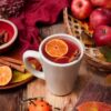 Cinnamon cider with apples and orange cloves.