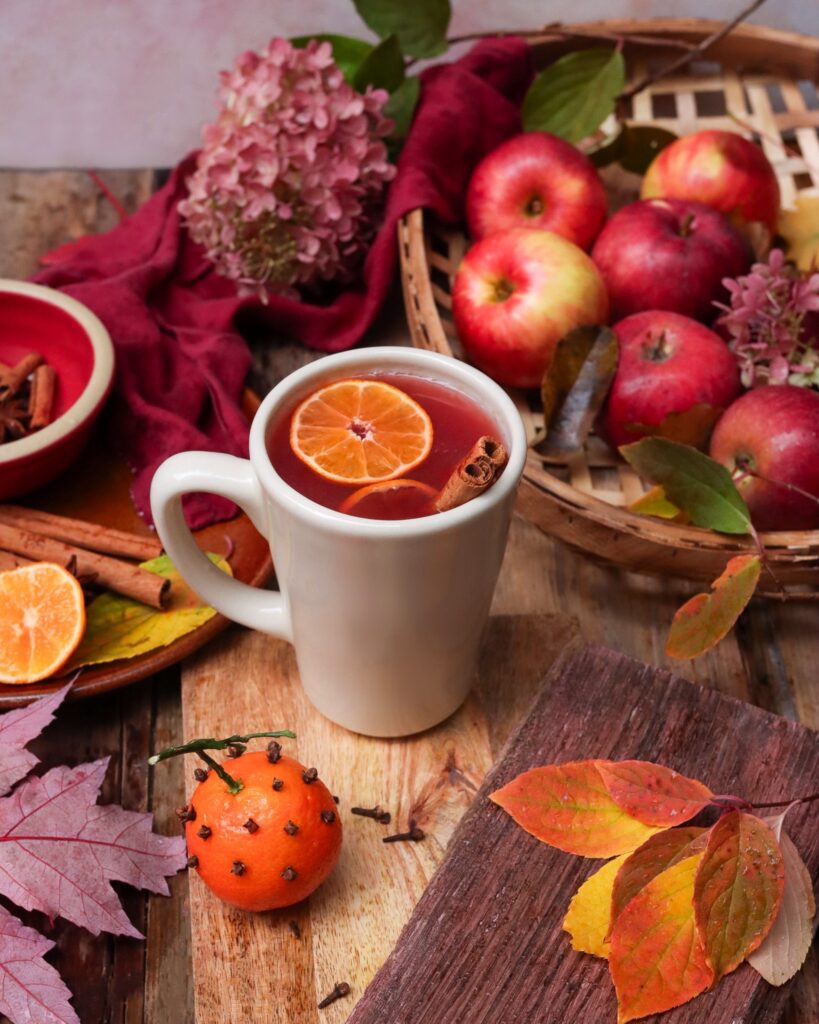 Cinnamon cider with apples and orange cloves.