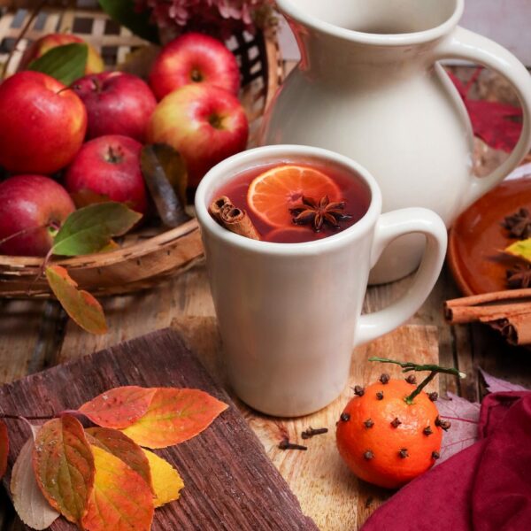 Cinnamon cider with apples and orange cloves.
