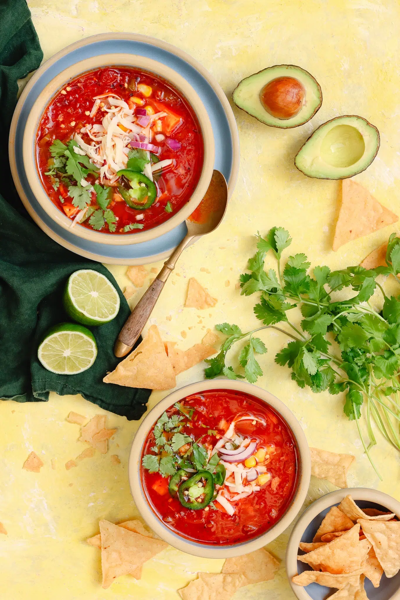 Mexican soup in a Brookline Cereal Bowl with fresh garnishments.